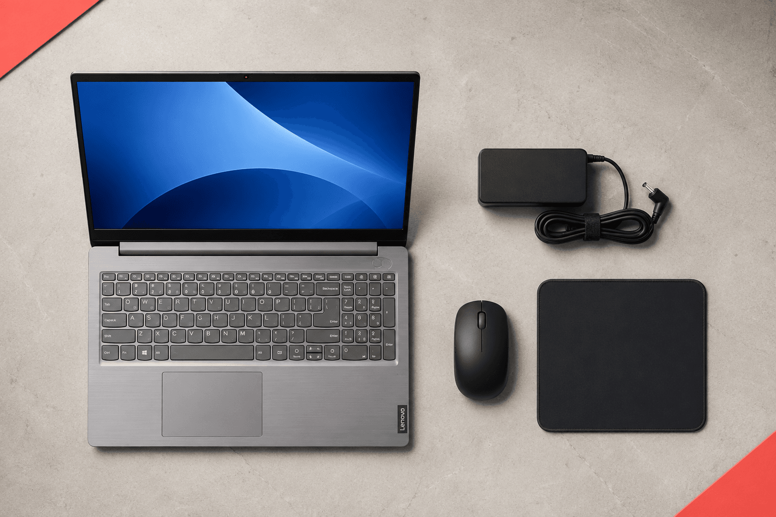 Lenovo ThinkBook 15-IIL 본체와 정품 충전기, 무선 마우스, 마우스패드 구성 연출 이미지