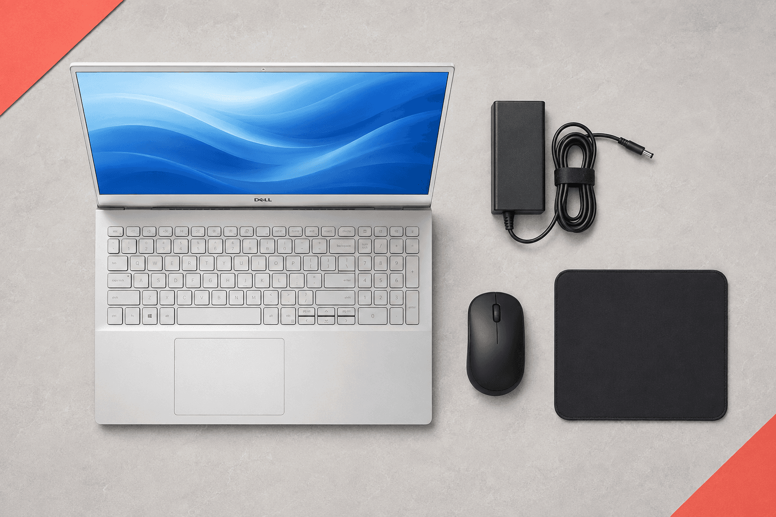 Dell Inspiron 15 5502 본체와 정품 충전기, 무선 마우스, 마우스패드 구성 연출 이미지